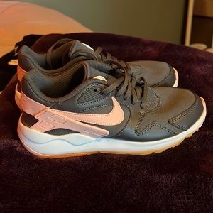 Pink and grey Nikes